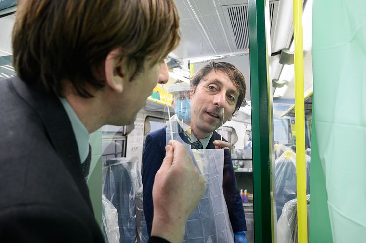 Southern onboard supervisor Jeremy Moss carries out a swab test on board the Southern train at Brighton station