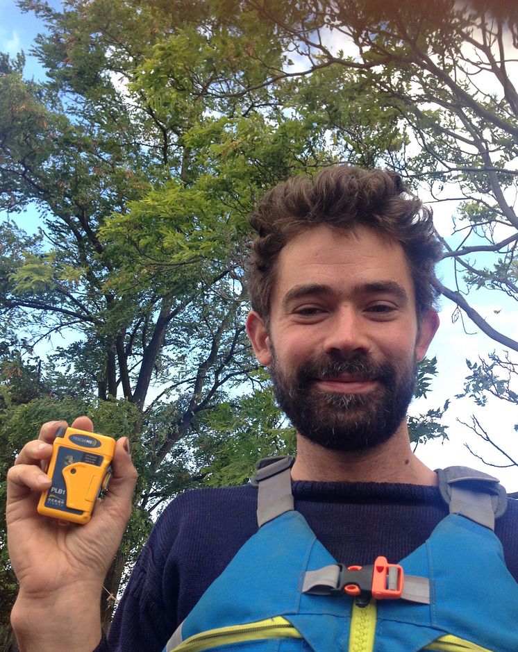 Hi-res image - Ocean Signal - Adam Weymouth with the Ocean Signal rescueME PLB1 that he carried during his Alaska journey