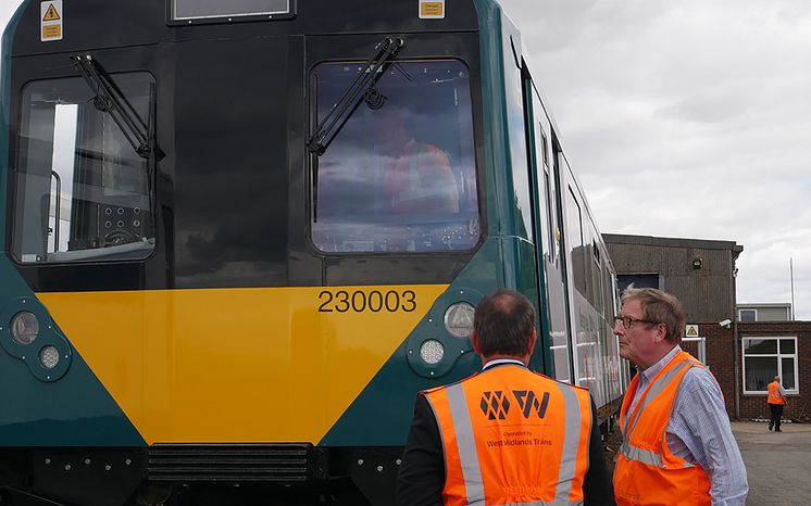 Jan Chaudhry-van der Velde and Adrian Shooter at Long Marston to unveil with special livery for the upcoming Class 230 units