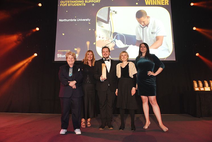 L-R Awards host, broadcaster and comedian Sandi Toksvig; Barbara Davies, Barry Hill and Dianne Ford from Northumbria University and Isabelle Bristow of award sponsor Studiosity 