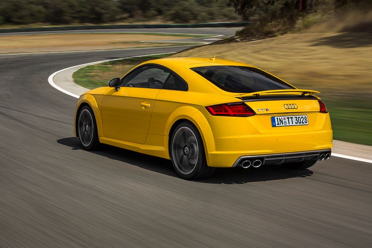 TTS Coupe yellow rear left side dynamic