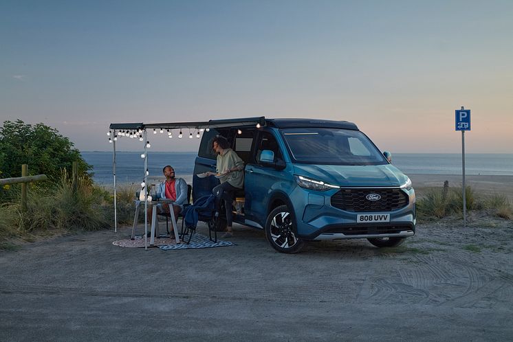 2024FordTransitNuggetActivePHEV_2_3-4_front_awning.jpg