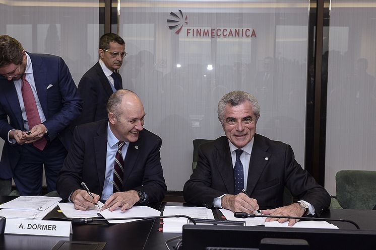 Alistair Dormer, Global CEO Hitachi Rail Group and Finmeccanica’s CEO and General Manager Mauro Moretti in Rome on November 2, 2015. 