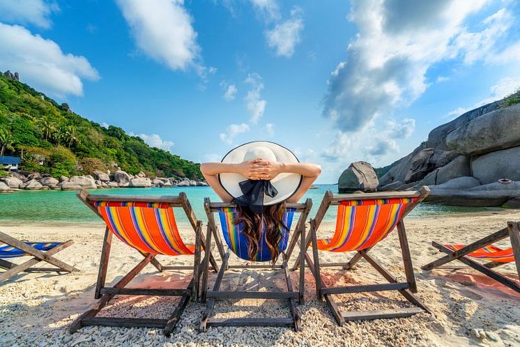 woman-with-hat-sitting-chairs-beach-beautiful-tropical-beach-woman-relaxing-tropical-beach-koh-nangyuan-island.jpg