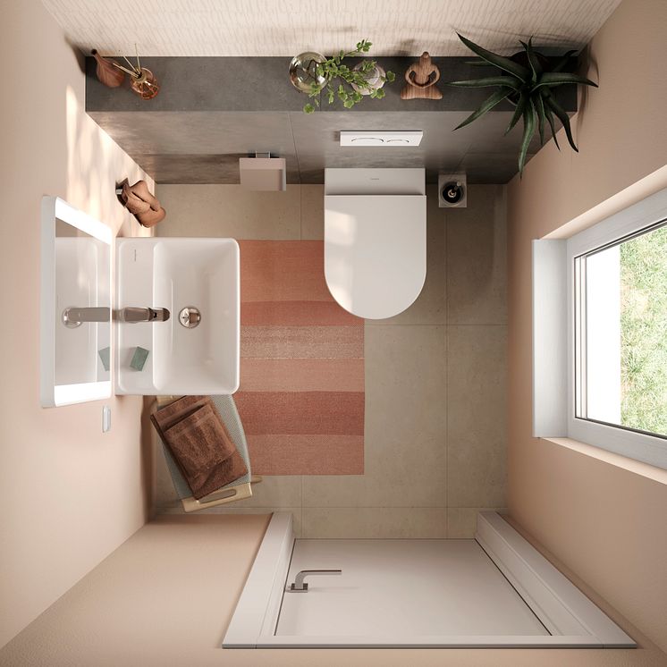 Gæstetoilet med hansgrohe toilet og vask