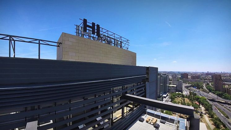 Hitachi Rail logo being installed on former GTS site in Madrid, Spain