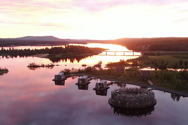 Drone view over Arctic Bath in midnight sun