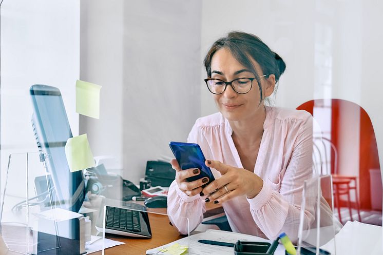 businesswoman-received-good-news-on-mobile-phone-2022-08-07-10-41-38-utc.jpg