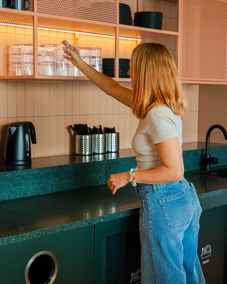 Guest helping themselves in the guest kitchen