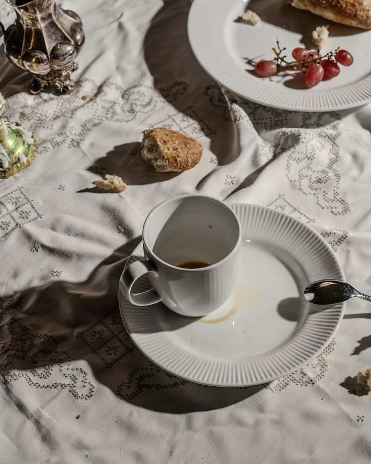 Fyrklövern Nordic Dawn Glimt dukning 