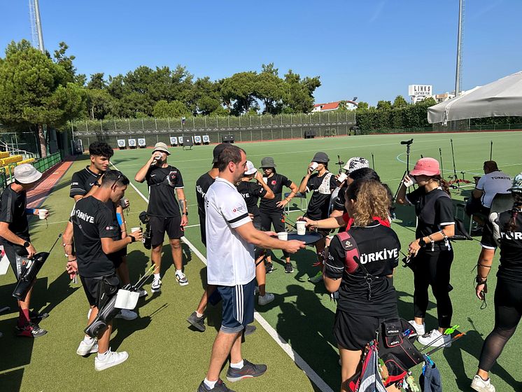 Ozcan Esen working with Turkish national archery team.jpg