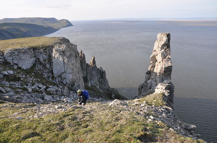 Members of the research team obtaining samples used in the study from the Taba-Ba’astakh cliffs