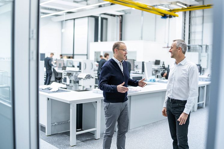 Stefan Dreyer (left) and Adam Baker (right) in one of the workshops for the combustion engine.jpg