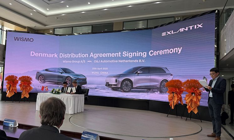 Signing Exlantix.jpg