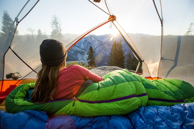 THEME_PEOPLE_CAMPER_WATCHING_THE_SUNRISE_FROM_A_TENT_GettyImages-531284673_Universal_Within usage period_66463 (1).jpg