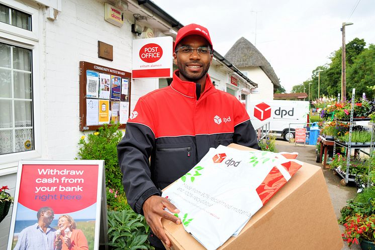 DPD driver posing outside Post Office with parcels and PO branding HIGH RES.JPG