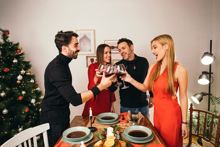 group-four-friends-dining-christmas.jpg