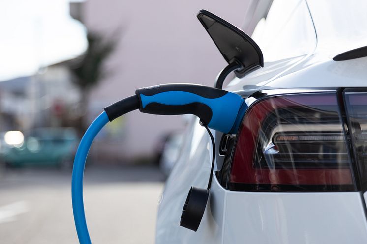 mp43221629-ev-electric-car-pluged-charging-at-a-recharge-station-in.jpg