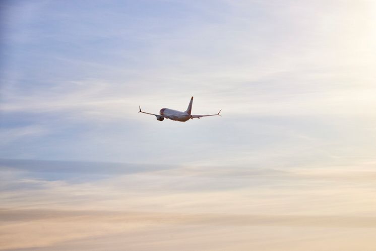 Norwegian MAX in colourful sky.jpg