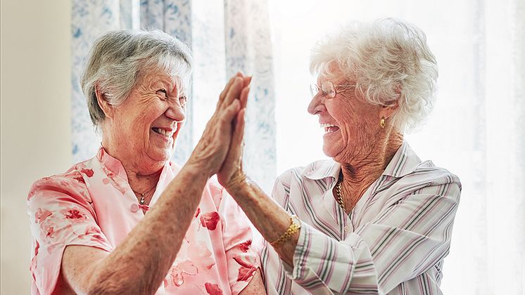 mp60518271-good-friends-make-the-years-golden-two-happy-elderly MND.jpg