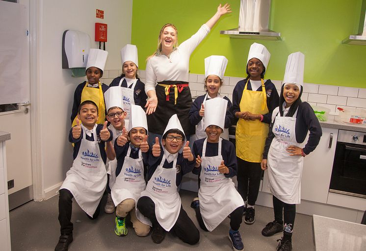 Pupils from Manor Park Primary with the Potato Queen, Poppy Cooks.jpg