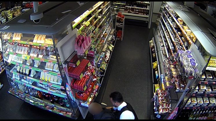 PC Younger tackles suspect.jpg