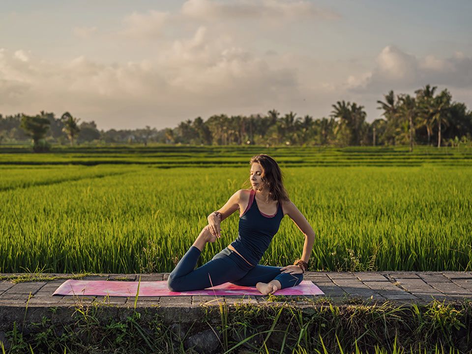 Woman is doing yoga in Ubud