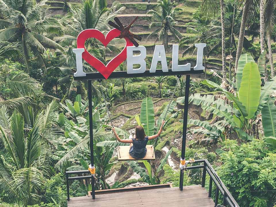 Bali swings with the inscription above