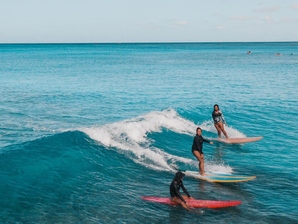 Women are taking surf lessons in Bali